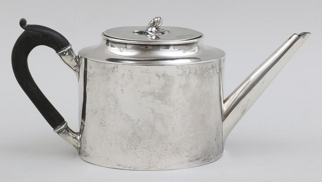 18th century French silver teapot: 18th century French silver teapot by Roch-Louis Dany, Paris with flower knop and wood handle, marked. Minor repairs to lid and body. 5-1/4''h. Total approximate weight 17.3 troy oz.