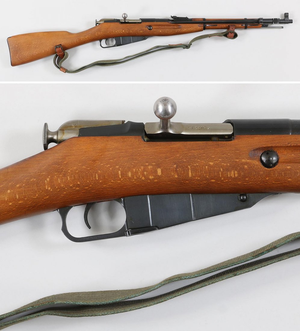 Polish Mosin Nagant M44 Bolt Action: Polish Mosin Nagant M44 Bolt Action Carbine in 7.62x54R. The barrel measures 20 Â«'', is marked with the number 11 in a circle, and dated 1953. A folding bayonet is attached to the barrel behind the
