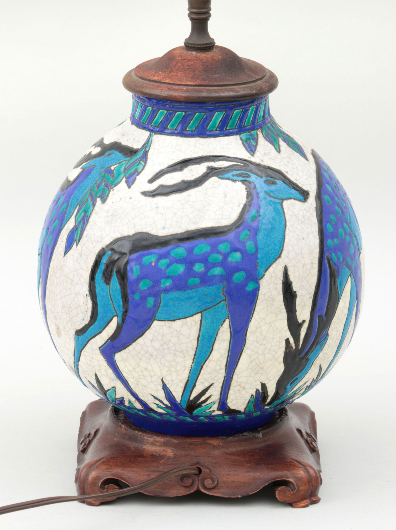 CHARLES CATTEAU (French, 1880-1966): CHARLES CATTEAU (French, 1880-1966) for Boch Freres, Art Deco ceramic vase mounted as lamp, with grazing gazelles in green, blue, and black on cream crackle ground. 9-1/2''h (excluding base).
