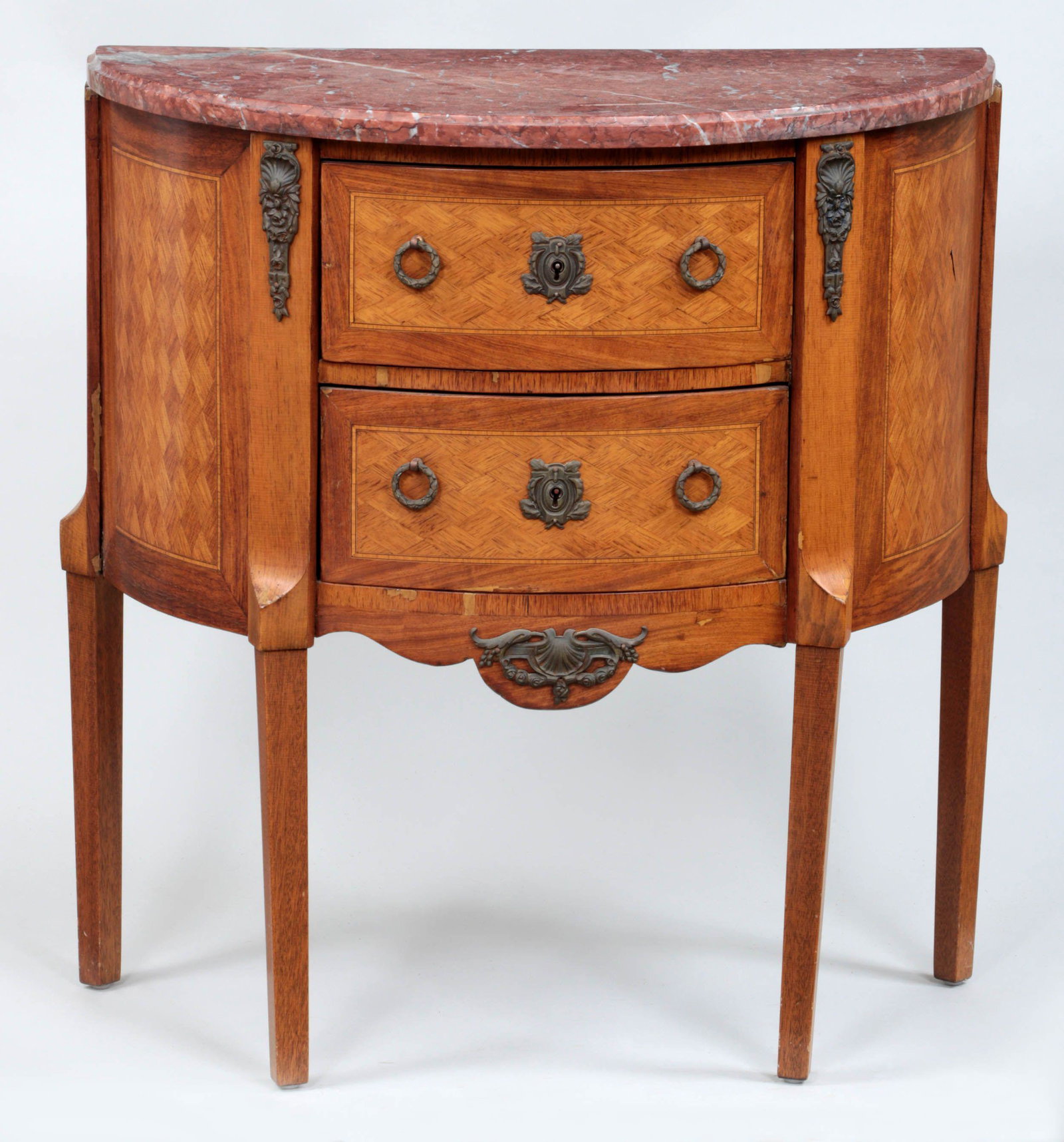 Marble top demi lune commode: Marble top demi lune commode with parquetry decorated case having two drawers, set on square tapering legs. Repairs and losses, minor nicks to marble. 27-3/4''h, 26''w, 14''d.