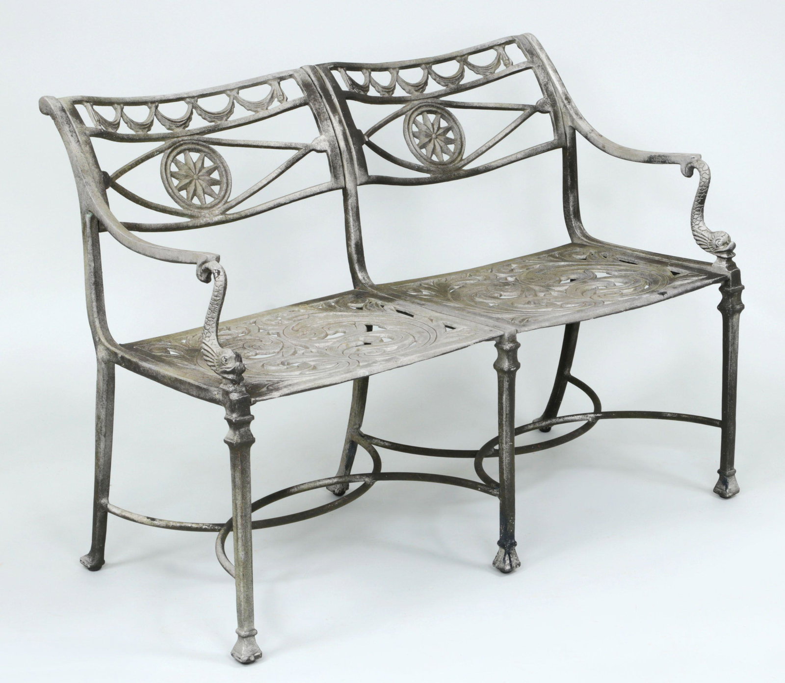 Neoclassical style cast aluminum garden benches: Neoclassical style cast aluminum garden benches, with double chairback form and dolphin support arms. 30-1/2''h, 42''w, 24''d.