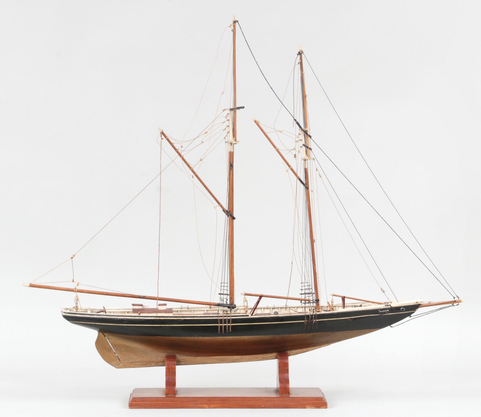 Ship model of the Canadian boat: Ship model of the Canadian fishing and racing gaff rig schooner, ''Bluenose''. Some strings detached, split to stand. 29''h, 5-1/2''w, 32-3/4''d (including stand).