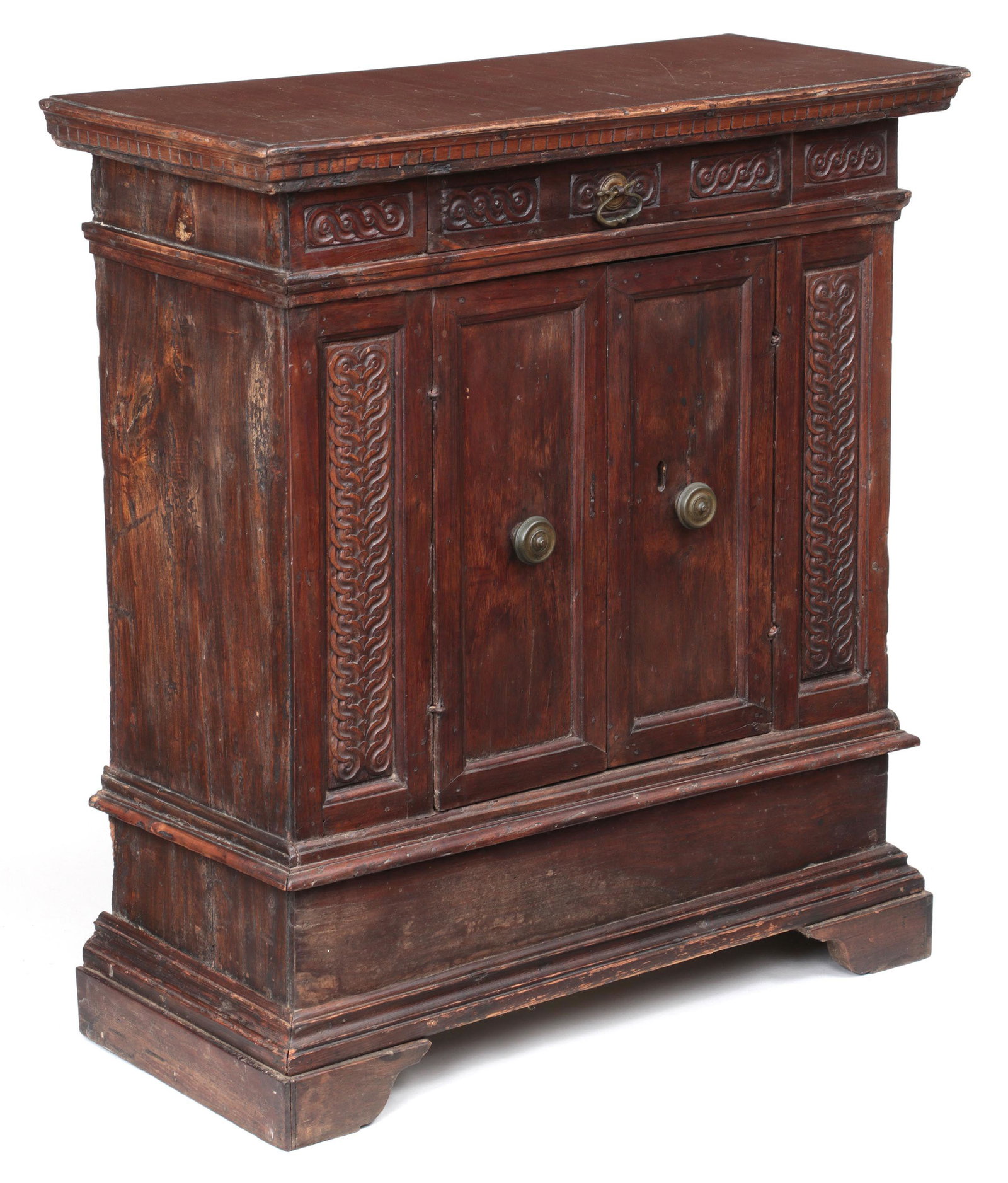 Italian Baroque walnut credenza: Italian Baroque walnut credenza with drawer, having guilloche-carved friezes and uprights, raised on bracket feet, 17th/18th century. Repairs and replacements, insect and water damage to back and bott