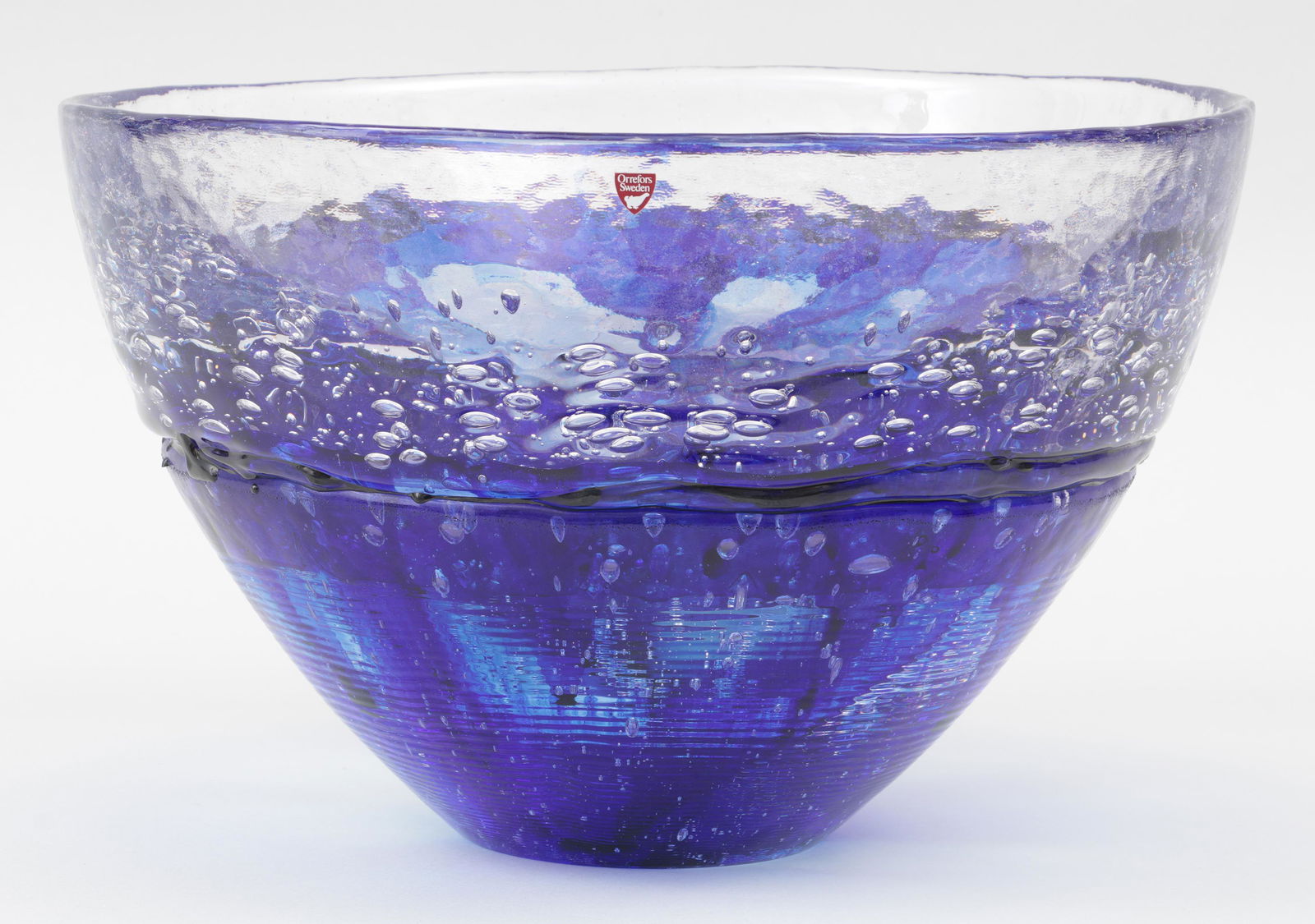LARS HELLSTEN (Swedish, b. 1933): LARS HELLSTEN (Swedish, b. 1933), large Orrefors bowl with cobalt pigmented bottom, bullicante glass, signed. 10''h, 15-5/8''dia.