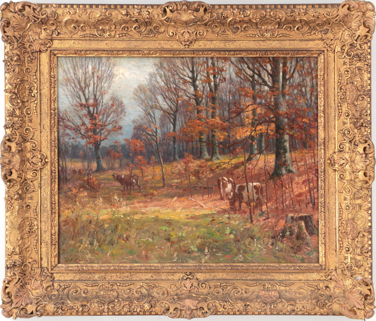 JOHN ELWOOD BUNDY (American, 1853-1933): JOHN ELWOOD BUNDY (American, 1853-1933), autumn landscape with cows, oil on canvas, signed lower left. Aging cracks, light inpainting, stretcher marks, and small tear lower right. Canvas 24''h, 30''w.