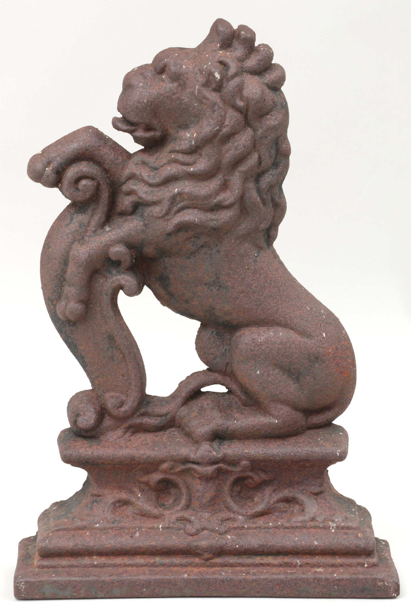 19th century English doorstop: 19th century English cast iron lion rampant doorstop. Mild oxidation. 14-3/4''h, 9-3/4''w, 2-3/4''d.