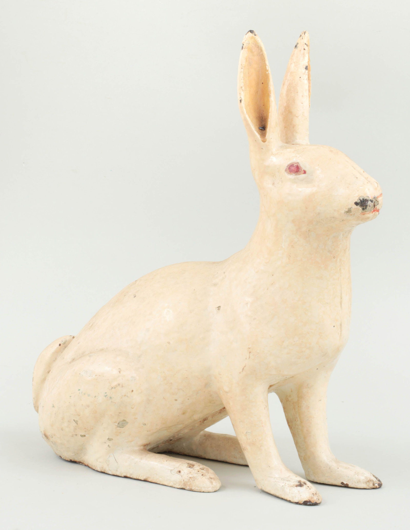 Cast iron white rabbit doorstop: Cast iron white rabbit doorstop. Repainted. 12-1/8''h, 5-3/4''w, 10-1/2''d.