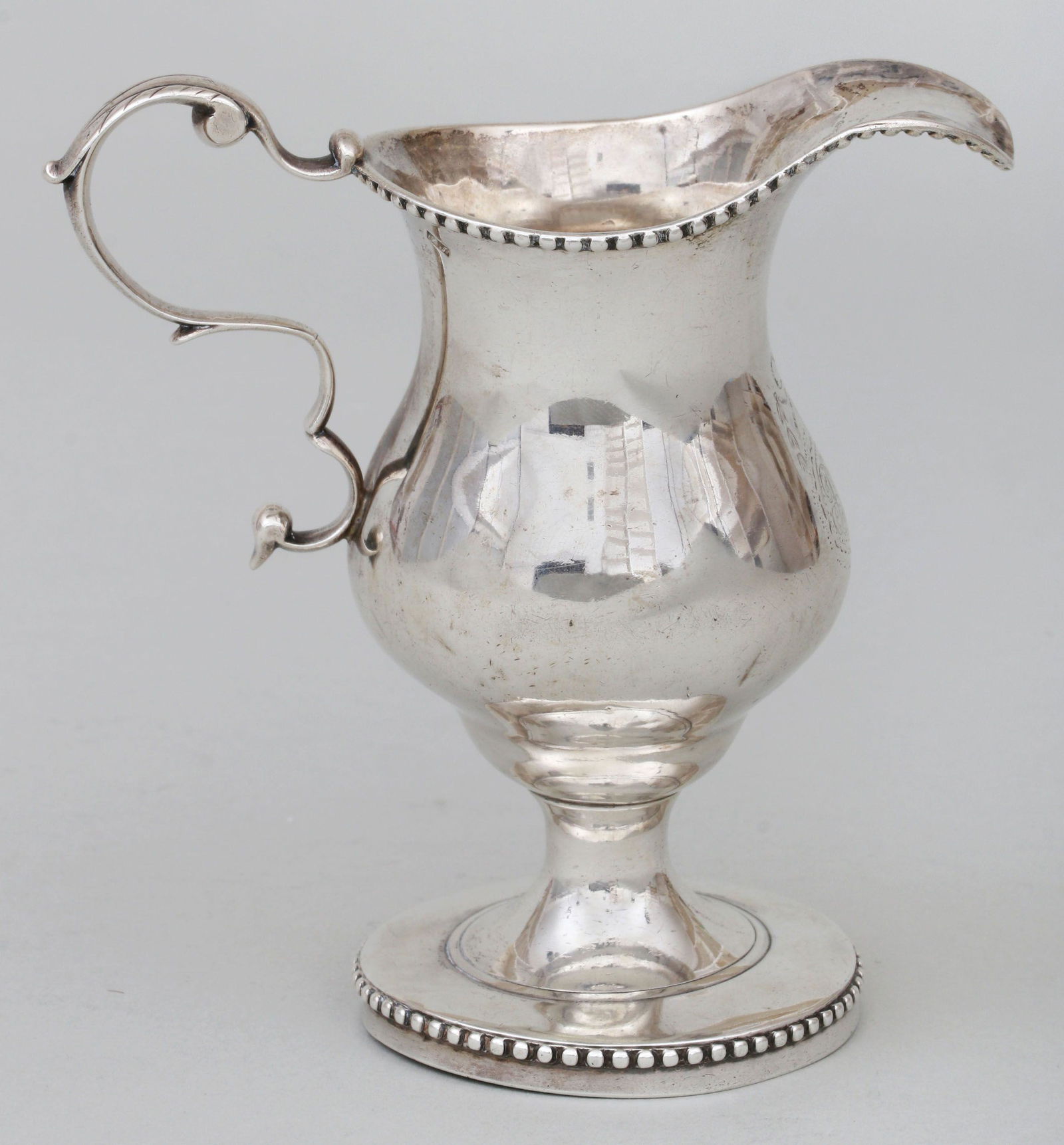 Early American cream pot, maker JS. (1 of 9)