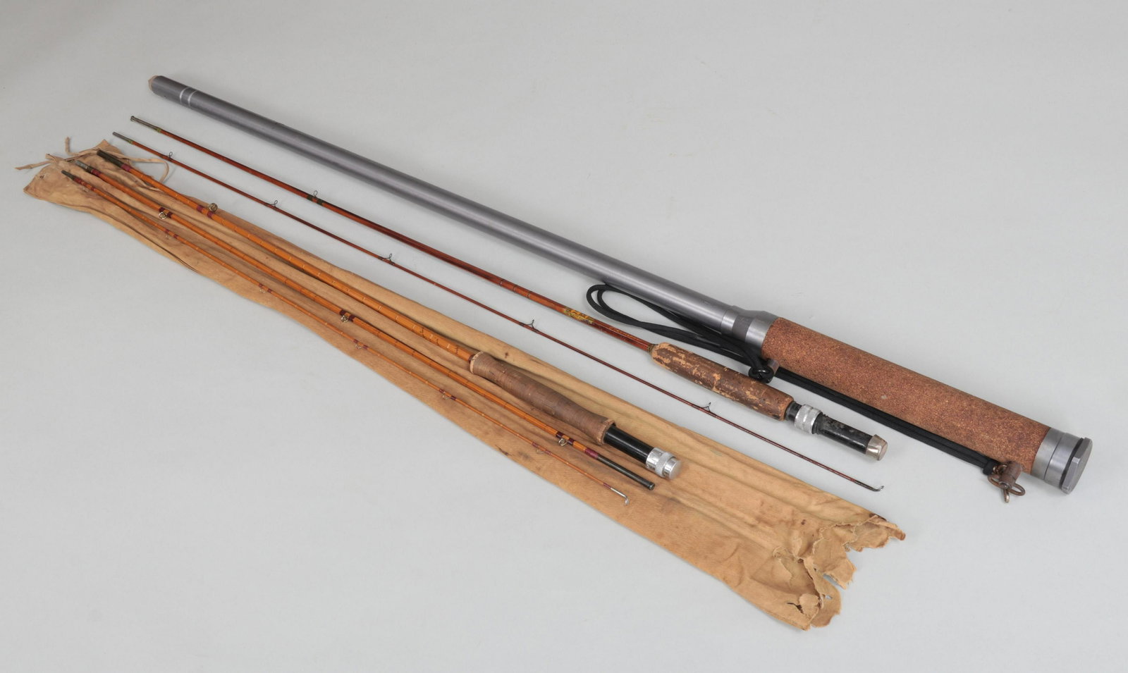 Group (2) rods: Group (2) rods together with an aluminum wading staff, to include: 1) H-I Princess 7'4'' 2-piece 1-tip trout rod in fair condition, but very fishable; 2) Hardy ''The DeLuxe Palakona'' 9' 3-piece 1-tip