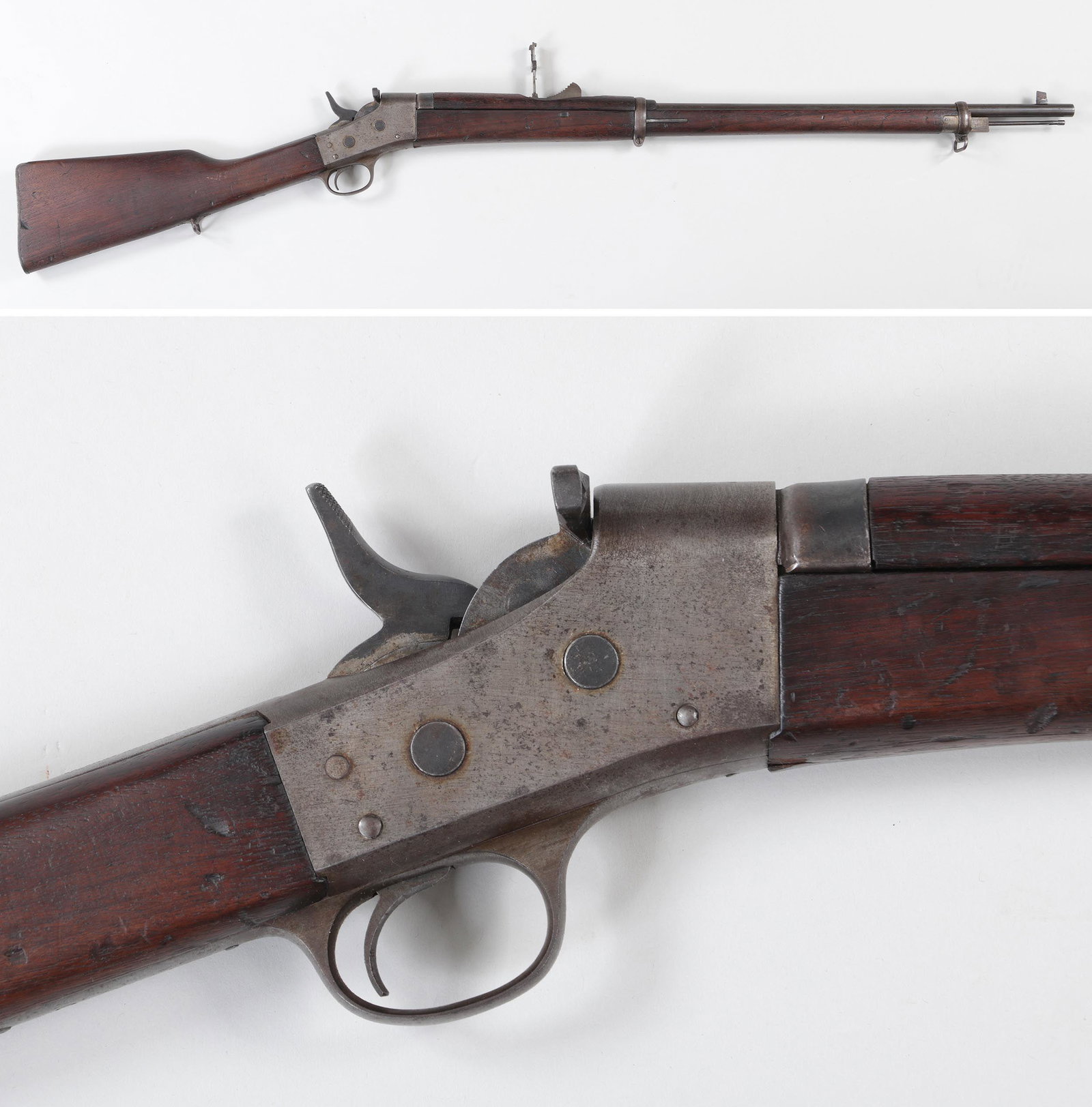 Remington Rolling Block: Remington Rolling Block military rifle in 7mm. The barrel measures 30'' held by two barrel bands with an adjustable ramp sight above wooden hand guard, bayonet lug and cleaning rod with wooden hand gr