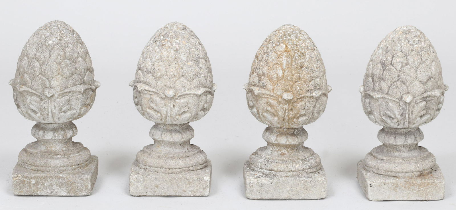 Set of (4) cast stone pineapple finials (1 of 3)