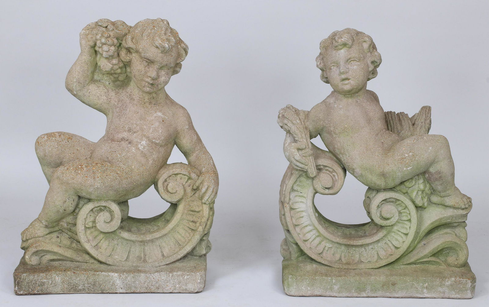 Pair of cast stone putti garden figures (1 of 7)