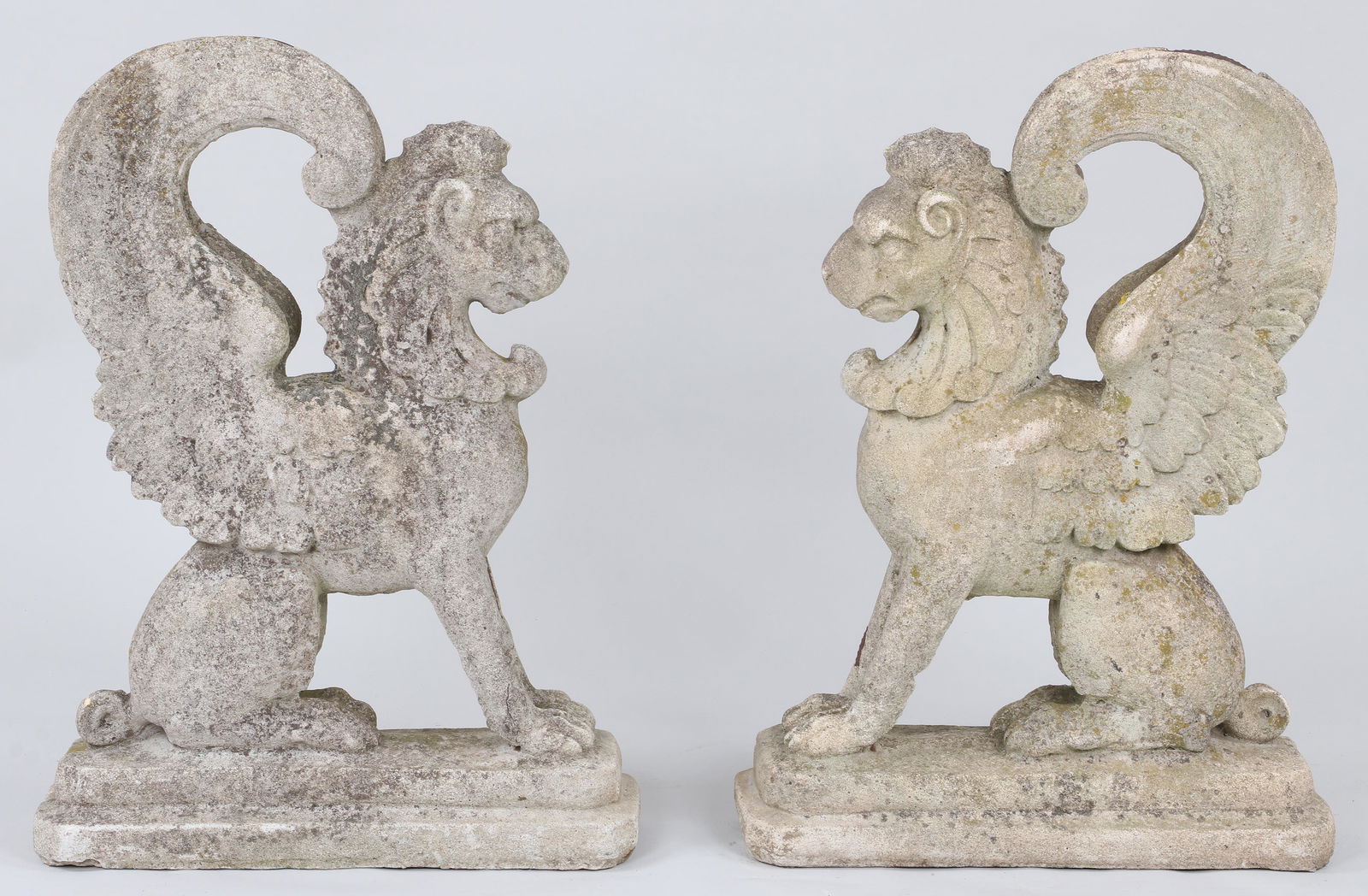 Pair of cast stone seated griffins (1 of 6)