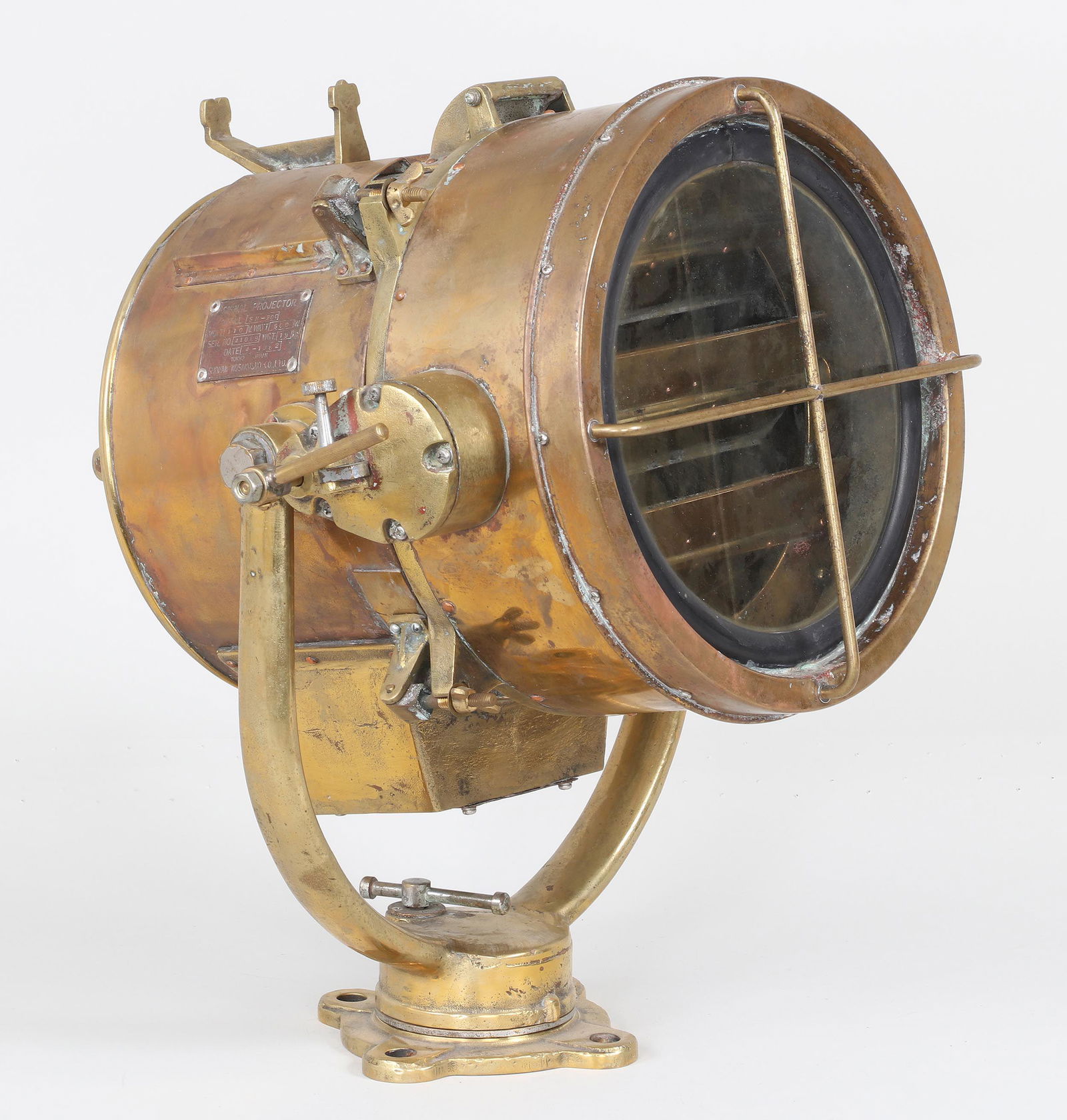 Bronze Marine signaling projector: Bronze Marine signaling projector, made in Japan by Shonan Kosakusho Co., ltd., 1982. Wear from use. 20''h, 19''w, 17''d.