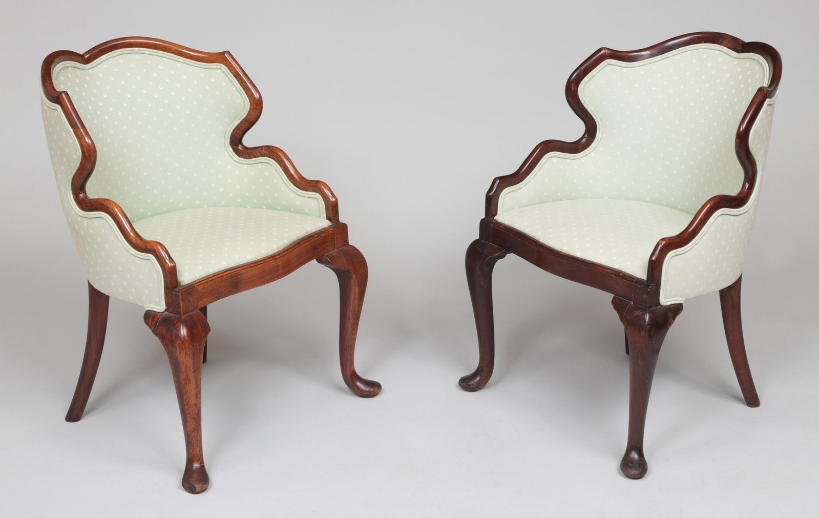 19th century diminutive bergeres: Pair of 19th century French diminutive bergere chairs. One with loss to foot and return, sunbleaching to one. 28-1/2''h, 21''w, 21-3/4''d.