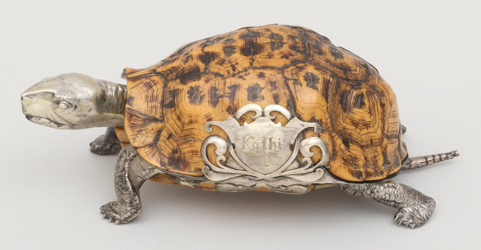 19th century silver mounted box turtle inkwell: 19th century silver mounted box turtle inkwell, having shell top and bottom, with engraved ''Kathi'' inscription to front, the interior containing three compartments. Lacking mounting nuts, possible l