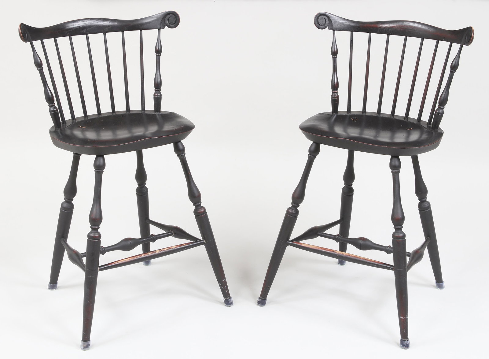 Pair of Warren Windsor-style bar stools: Pair of Warren Chair Works Windsor-style bar stools, painted black. Wear from use, foot caps added. 39-3/4''h.
