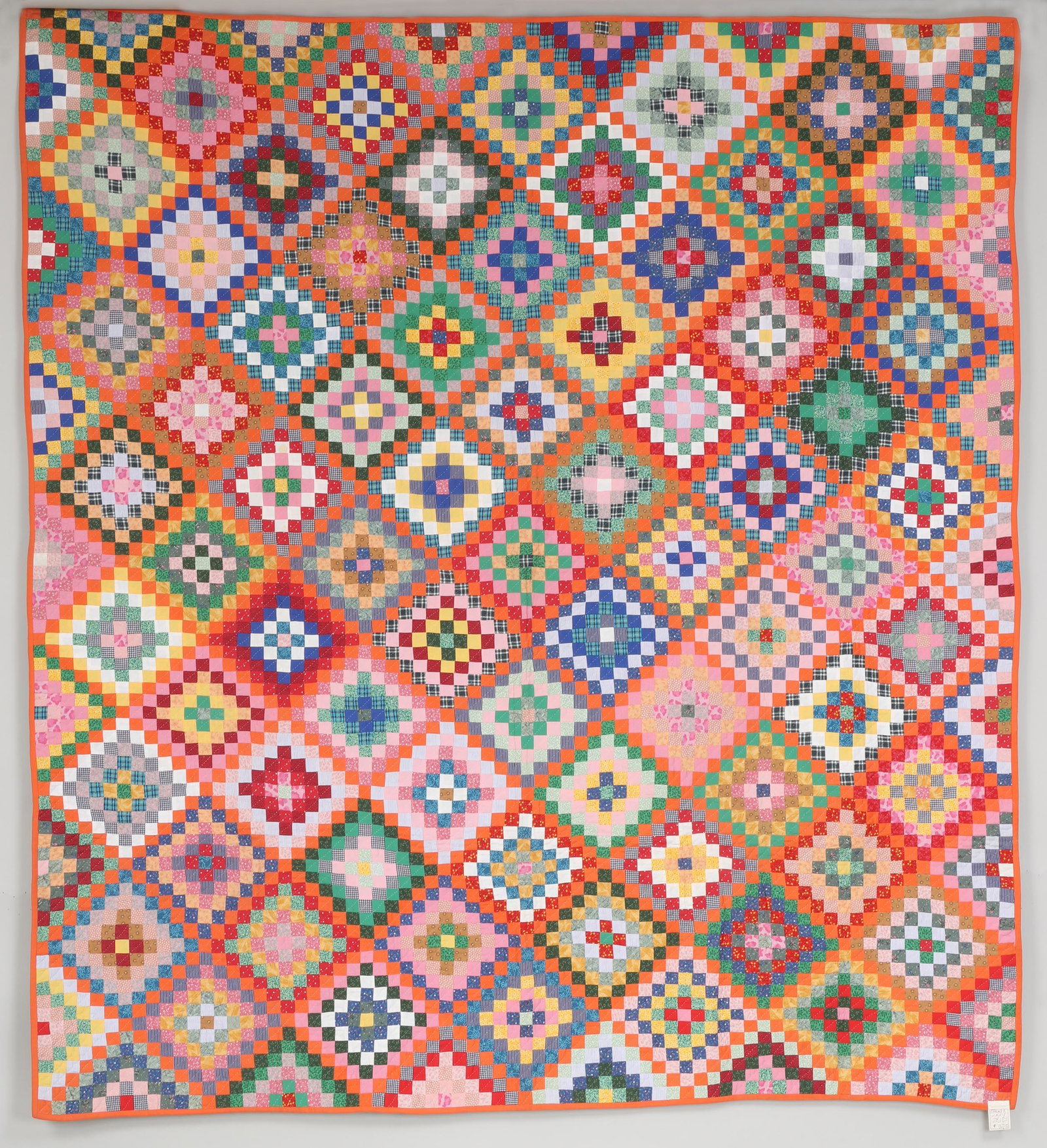 Philadelphia Pavement quilt: Philadelphia Pavement quilt with orange grid, circa 1930s, cotton. 78''h, 71''w. Provenance: Estate of Laura Fisher, New York, NY. Catalog note: ''...a brilliantly colored grouping of 1930s cotton pri