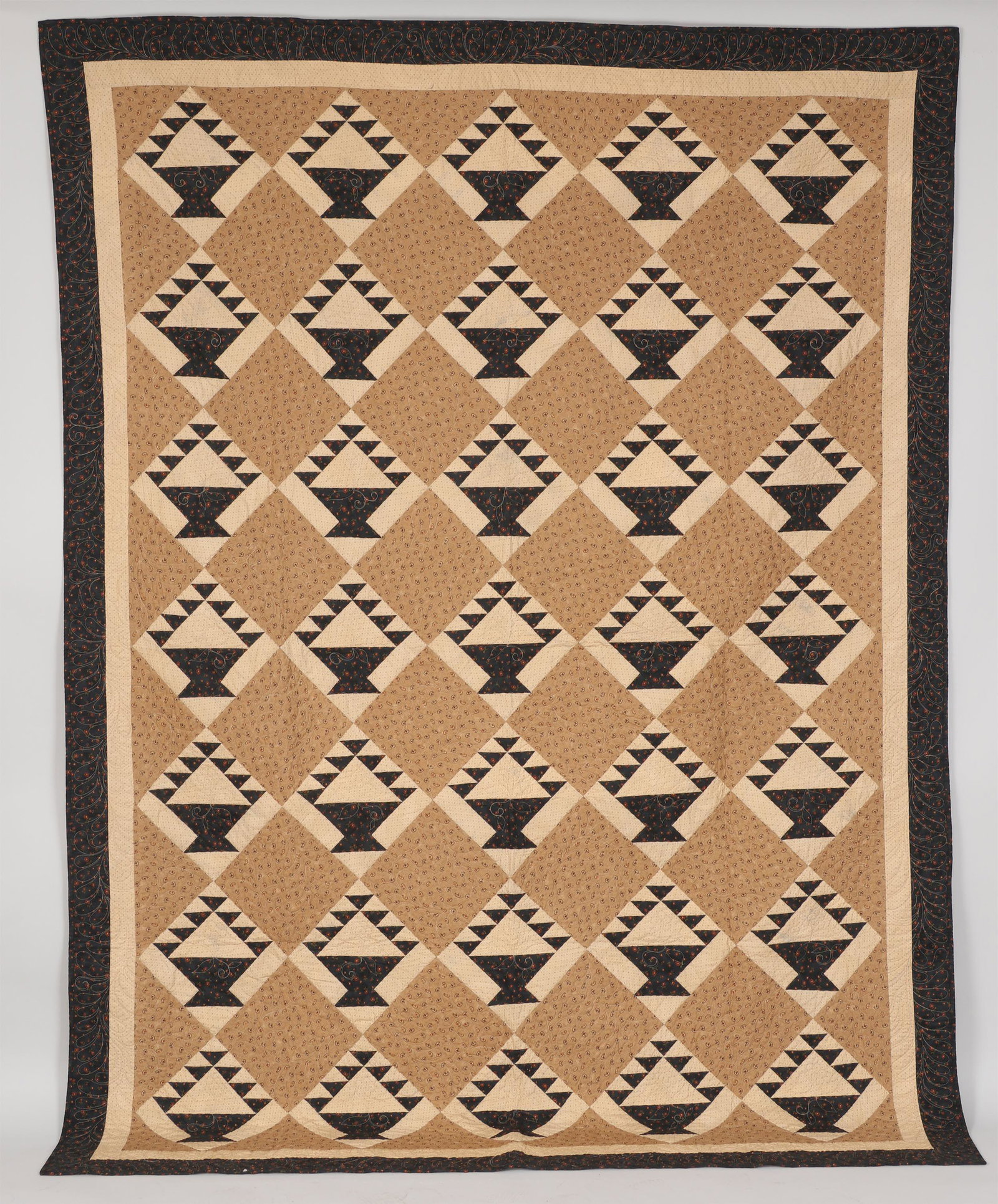 Basket of Chips quilt: Basket of Chips quilt with brown border. 109''h, 79''w. Provenance: Estate of Laura Fisher, New York, NY.