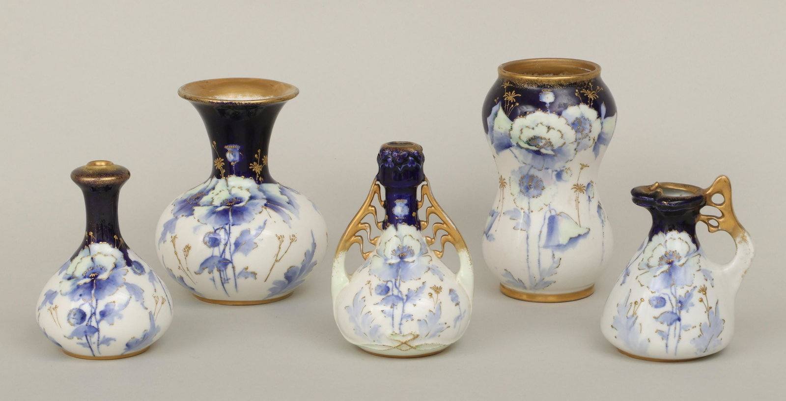 Set of (5) Amphora ''Carnation'' vases: Set of (5) Amphora Art Nouveau ''Carnation'' vases, all marked to bottom, one signed ''PD'' (Paul Daschel). Minor surface wear, hairline to handle of signed vase, chip to rim of double gourd vase. Tal