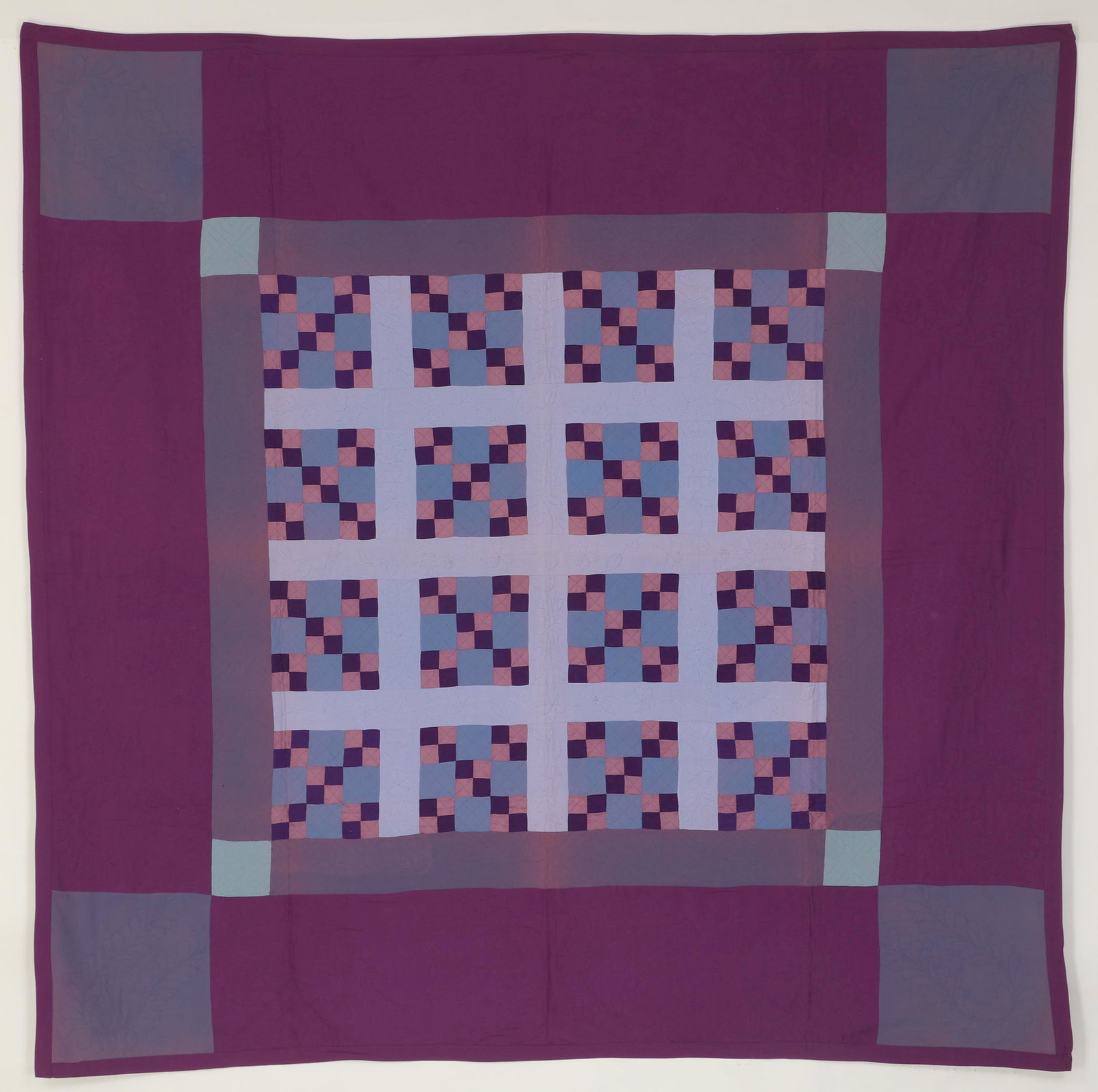 Amish Four-in-Nine Patch quilt: Amish Four-in-Nine Patch quilt, pieced in a square grid, Lancaster, PA, mid 20th century, cotton crepe. Some staining, small hole to border. 81''sq. Provenance: Estate of Laura Fisher, New York, NY. C