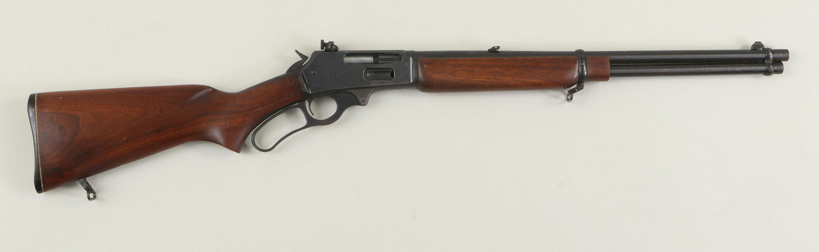 Marlin Model 336RC in 30-30 caliber: Marlin Model 336RC in 30-30 caliber. The round barrel with full-length magazine measures 20'' with a bright Micro Groove bore, flip-down rear sight and Lyman adjustable receiver sight with blade front