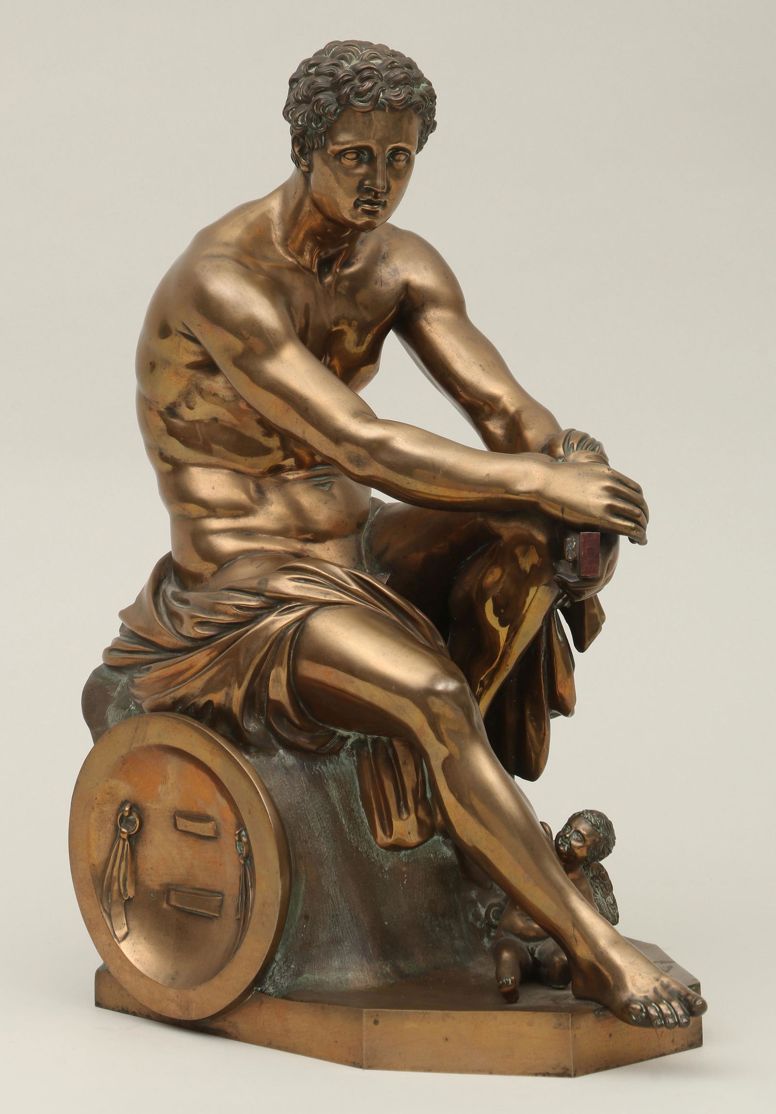 BENEDETTO BOSCHETTI (Italian, 1820-1879): BENEDETTO BOSCHETTI (Italian, 1820-1879), bronze after the Ludovisi Ares, depicting Mars and Cupid, stamped ''B. Boschetti'' and ''Roma'' to right side of base. Sword lacking grip and pommel, minor su