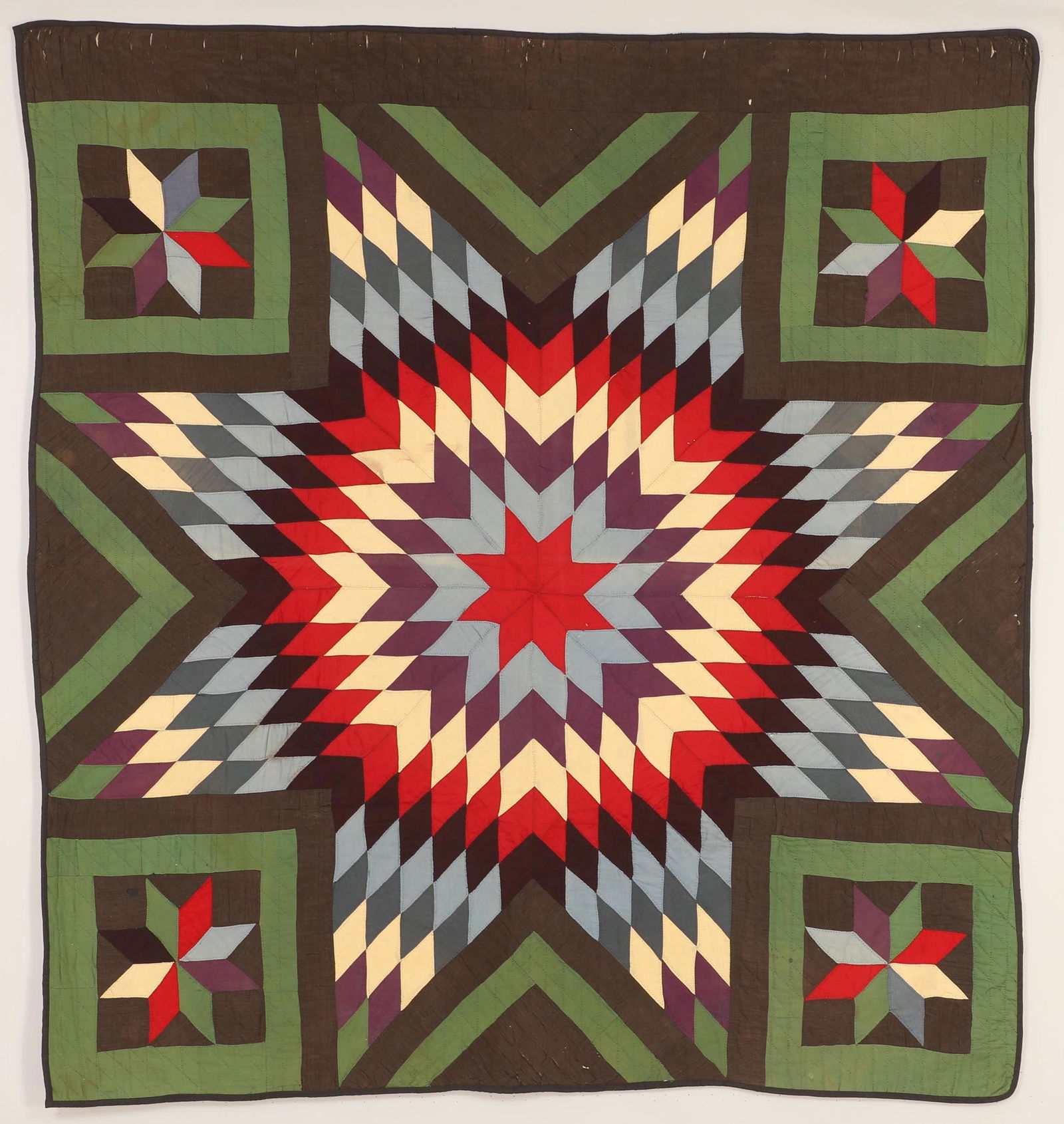 Lone star quilt: Lone star quilt with four satellite stars. Some wear and separating, dampstains, small repair. 74''h, 69''w. Provenance: Estate of Laura Fisher, New York, NY.