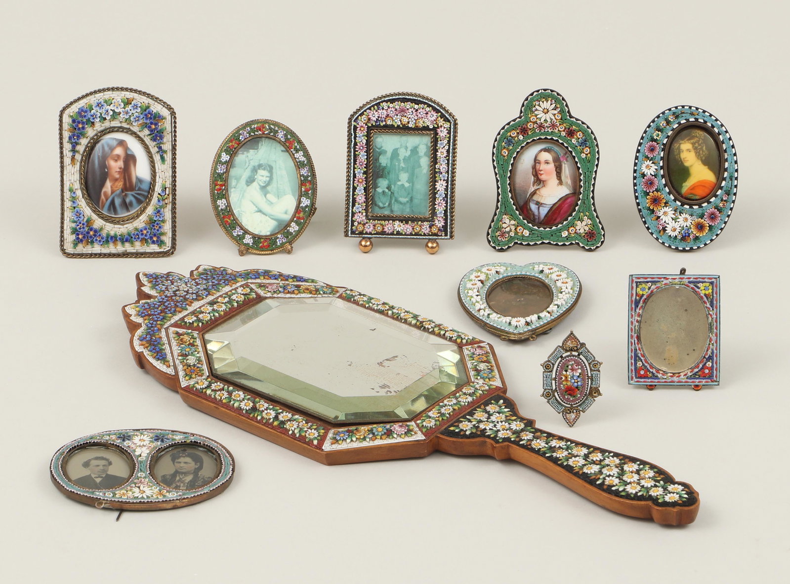 Group of (10) Italian micromosaic items: Group of (10) Italian micromosaic items with floral designs, to include: hand mirror with decorative crest and octagonal, beveled mirror, (minor losses, desilvering, wear); brooch, with wire easel-bac