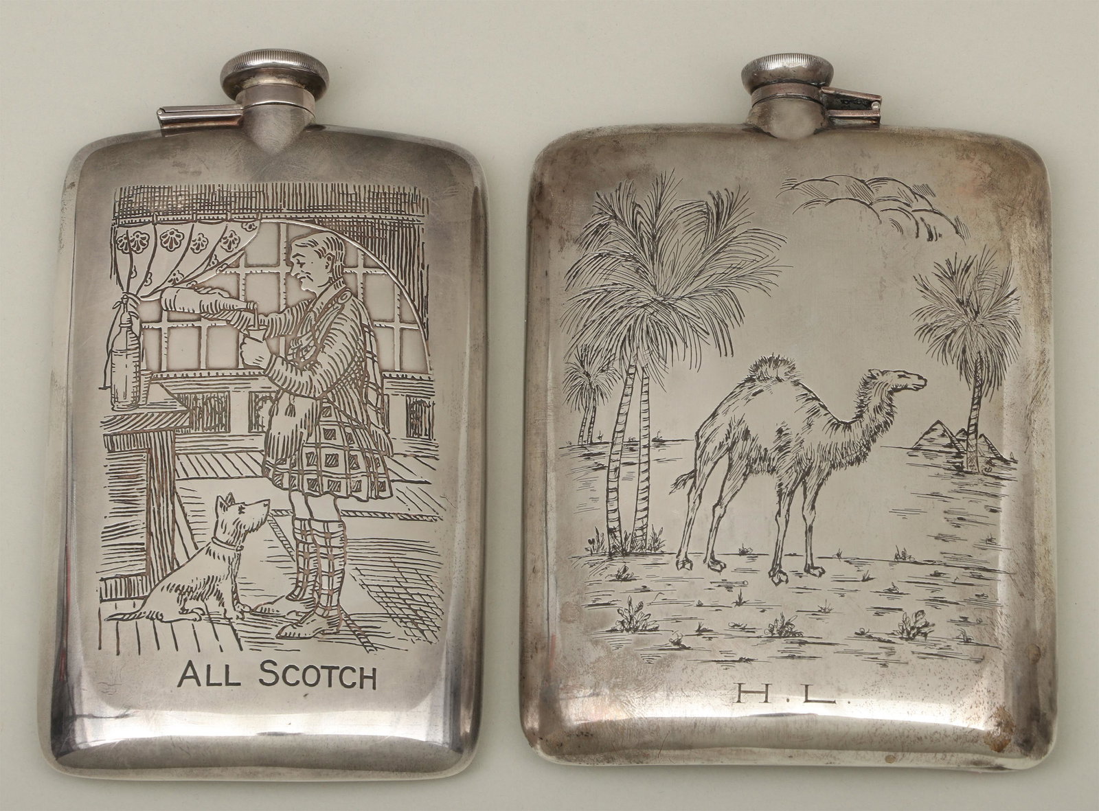 Group of (2) etched sterling silver flasks: Group of (2) etched sterling silver flasks, to include: one depicting camel in a desert, monogrammed ''H.L.'', marked ''STERLING'' to neck; and one depicting a Scottish gentleman engraved ''ALL SCOTCH