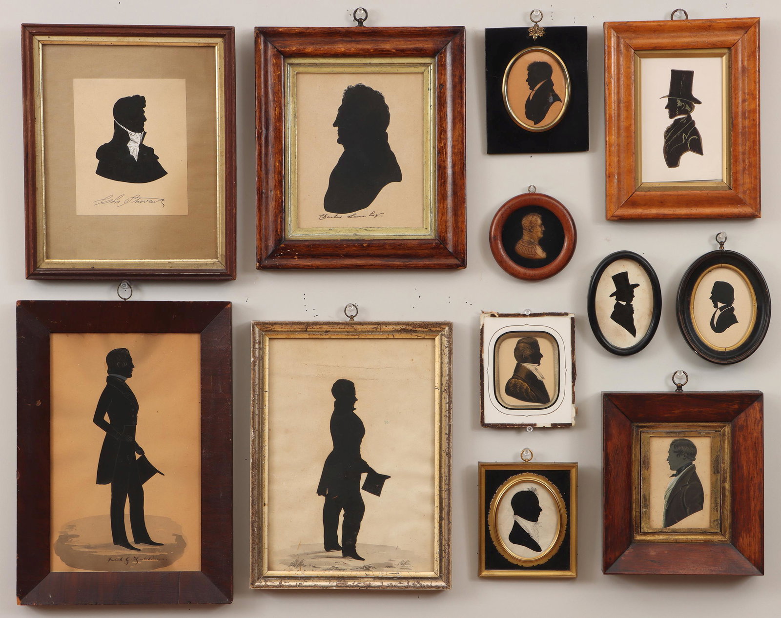 19C silhouette portraits: Group of (12) 19th century silhouette portraits depicting gentlemen, to include: JARVIS FRARY (JERVIS) HANKS (American, 1799-1853), full-length portrait of man with top hat and tails, 1828, cut-out pa