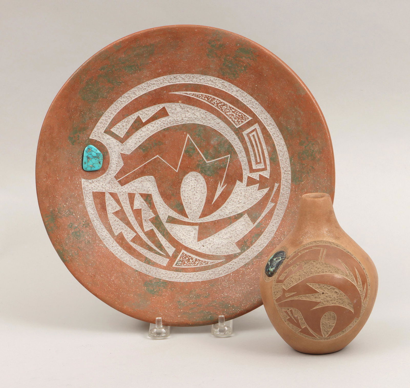 TSE-PE GONZALES: TSE-PE GONZALES (San Ildefonso Pueblo, 1940-2000), group of (2) sgraffito-carved micaceous clay pottery items, each with inlaid turquoise stone and bear surrounded by geometric designs, to include: pl