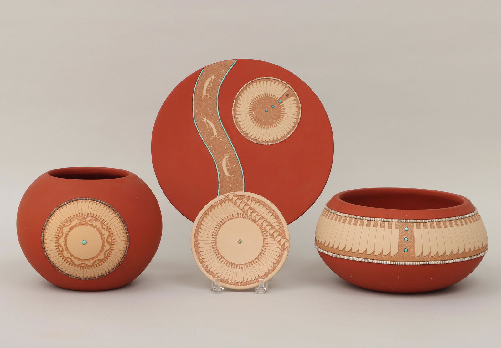 JOHN GONZALES: JOHN GONZALES (San Ildefonso Pueblo, b. 1955), group of (4) sgraffito-carved pottery having beads, turquoise and incised areas with micaceous slip, to include: miniature buffware plate, with feathers,