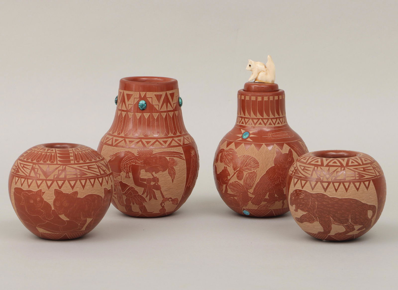 ELMER RED STARR: ELMER RED STARR (Sioux, 1937-2018), group of (4) sgraffito-carved redware jars, with feathers and geometric designs, to include: lidded jar depicting owl and squirrels, with (2) opal cabochons, the li