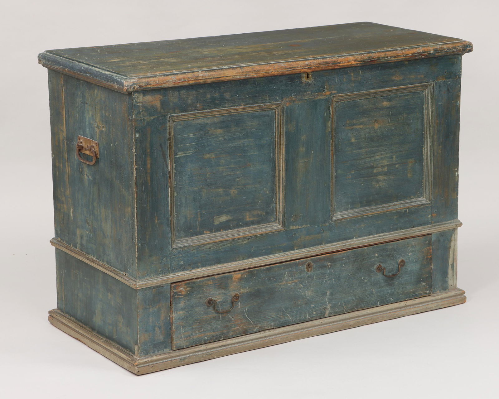 Long Island blue blanket chest: 18th century Long Island blue-painted country blanket chest with lift top, and sunken panel front, over a single drawer. Wear from use, repairs, paint appears to be later. 31''h, 44''w, 19-1/2''d.