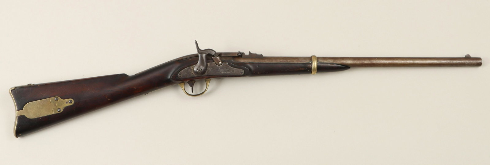 H. Merrill carbine in 54 caliber: H. Merrill carbine in 54 caliber. The round barrel measures 22'' to the opening of the breech, with visible rifling and three range tip-up rear sights. The lock and breech plunger with copper tip are 
