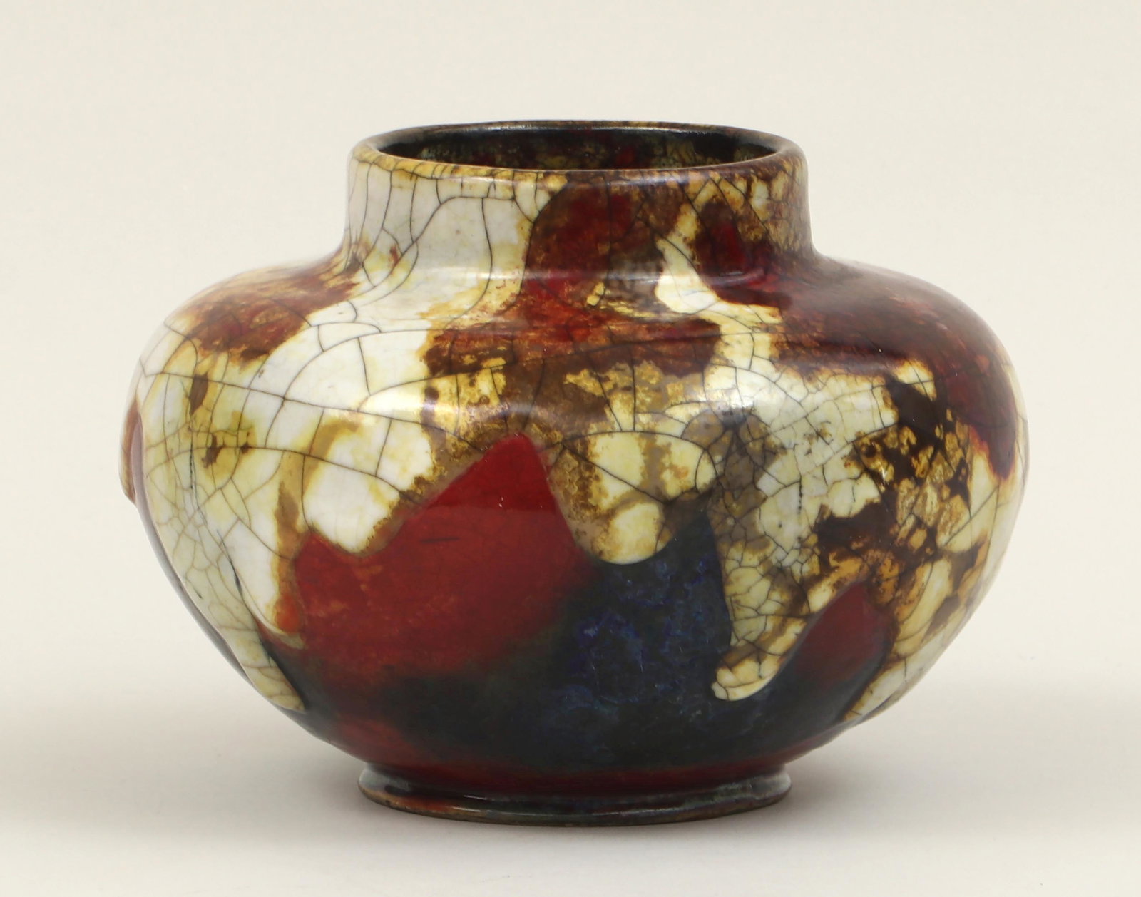 Chang ware vase: Royal Doulton Chang ware squat vase, by CHARLES NOKE (British, 1858-1941) and HARRY NIXON (British, 1886-1955), signed and marked to bottom. 6''h, 8-1/2''dia. IMPORTANT SHIPPING INFORMATION 1 - LIVE-S