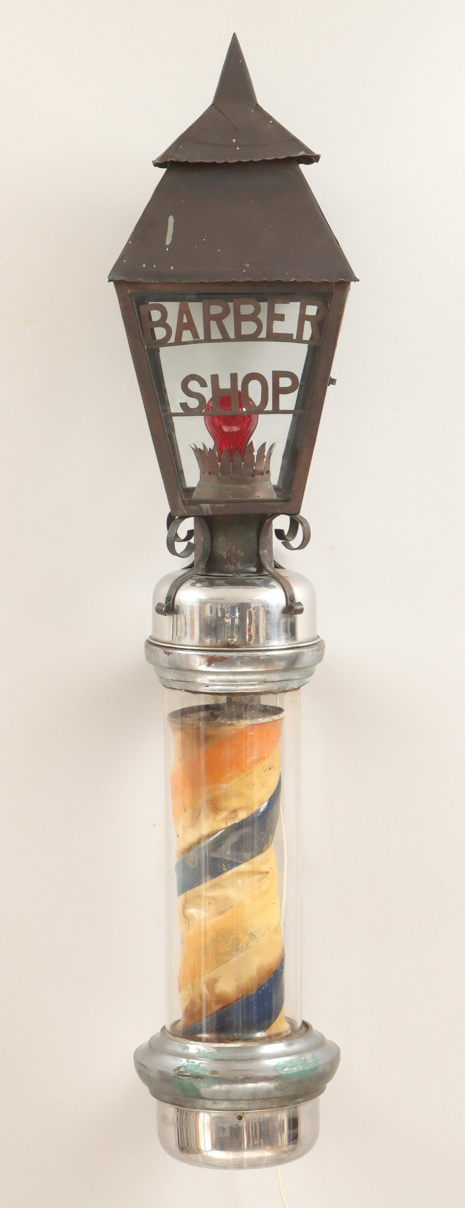 Barber shop trade sign: Barber shop trade sign, with chrome and glass-enclosed plastic barber pole, surmounted by copper lantern with four glass panels, each with cut-out copper ''Barber Shop'' letters. Needs rewiring, oxida