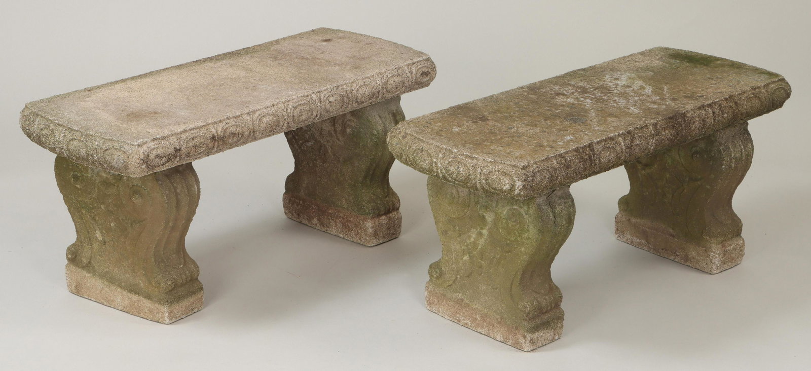 Pair of cast stone garden benches: Pair of cast stone garden benches. Bases with cracks and losses, one top with cracks and water damage. 16-1/2''h, 36-1/2''w, 15-1/2''d. IMPORTANT SHIPPING INFORMATION 1 - LIVE-SHIPPING : The service i