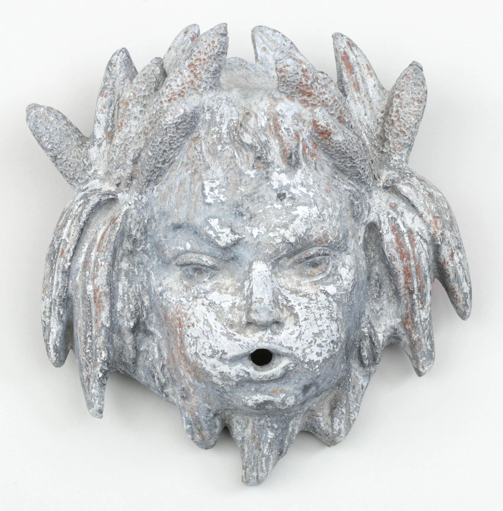 Cast lead fountain mask of boy: Cast lead fountain mask of boy. 8-1/2''h, 8-1/4''w, 3-1/2''d. IMPORTANT SHIPPING INFORMATION 1 - LIVE-SHIPPING : The service is provided by Liveauctioneers. This option is automatically added to your 