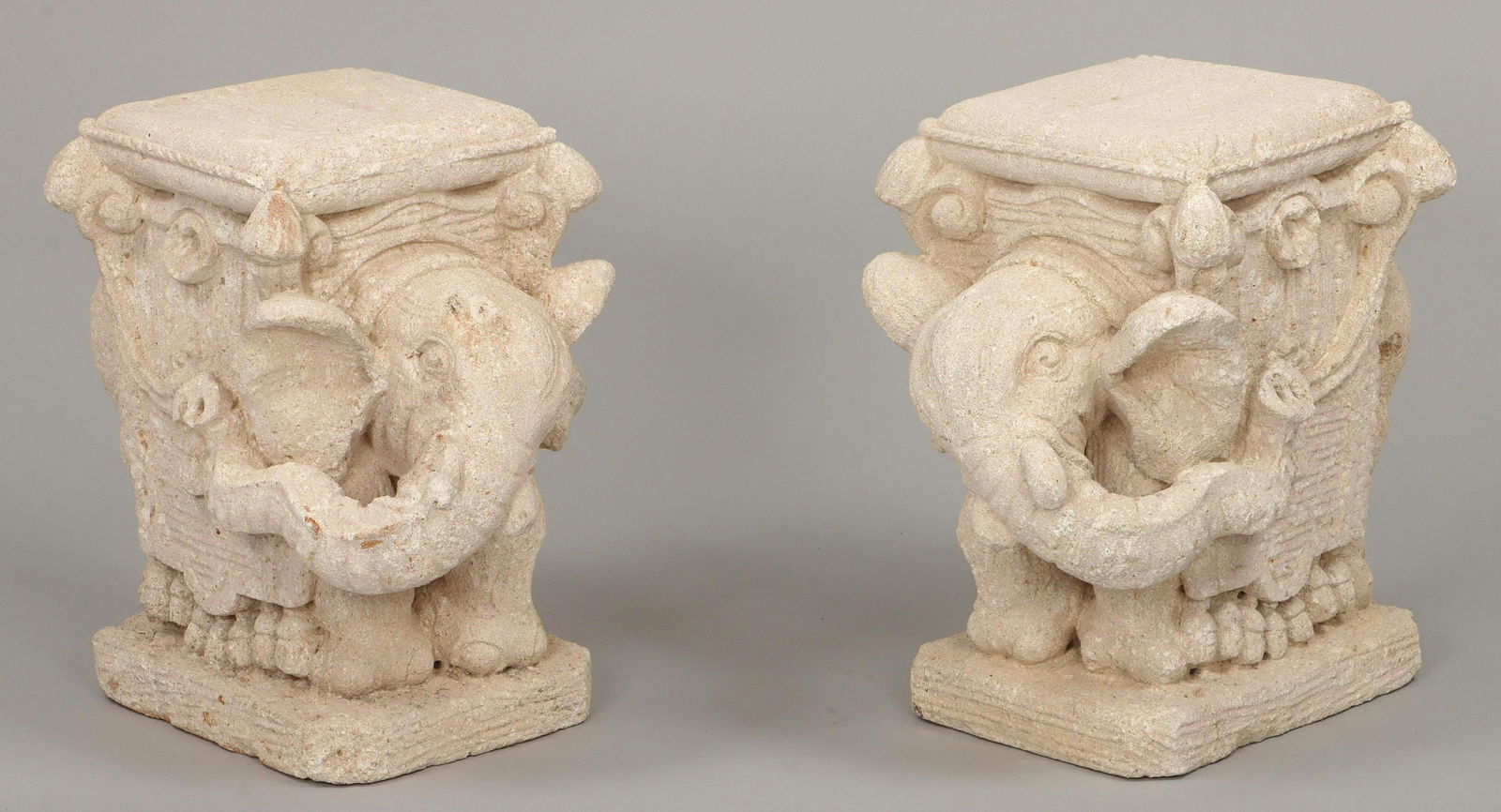 Sandstone elephant garden seats: Pair of carved sandstone elephant garden seats. Losses and wear. 19-1/2''h, 13-3/4''w, 21-1/2''d. IMPORTANT SHIPPING INFORMATION 1 - LIVE-SHIPPING : The service is provided by Liveauctioneers. This op