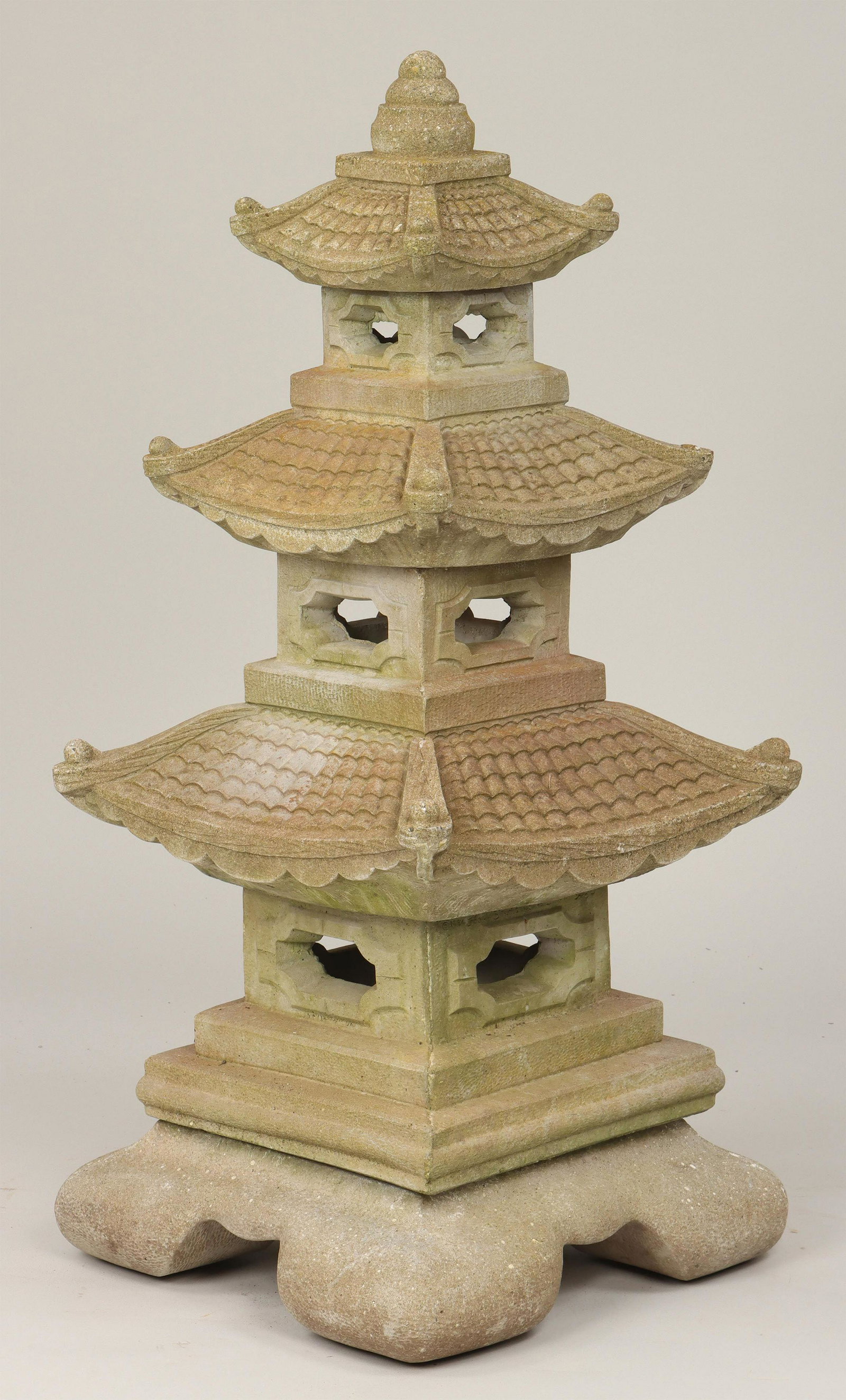Three level cast stone pagoda: Three level cast stone pagoda, in five parts, marked ''Henri Studios''. Weathered, minor chip to one inside rim, missing one roof corner finial. 41-1/4''h, 19''sq. IMPORTANT SHIPPING INFORMATION 1 - L