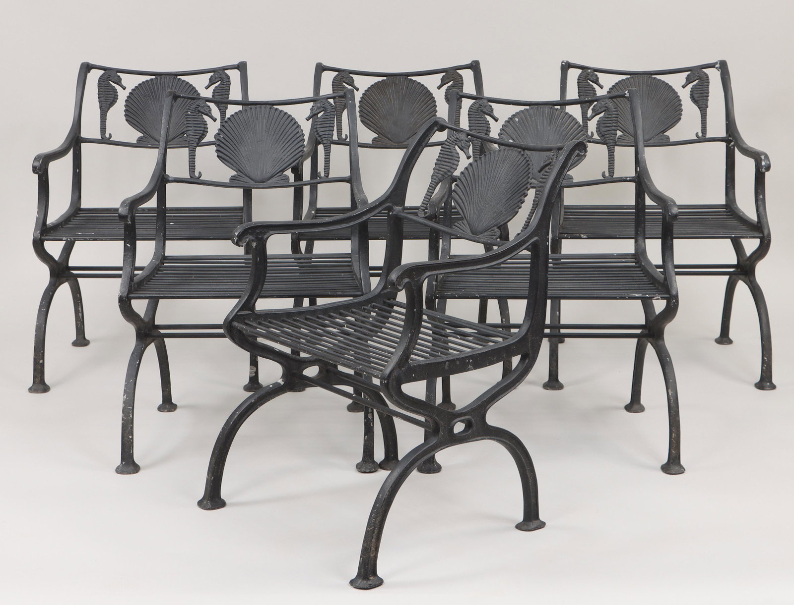 Set of (6) seahorse and scallop shell armchairs: Set of (6) seahorse and scallop shell armchairs, cast aluminum, purchased at Florentine Craftsman. Paint loss. 31''h, 23''w, 26''d. IMPORTANT SHIPPING INFORMATION 1 - LIVE-SHIPPING : The service is pr