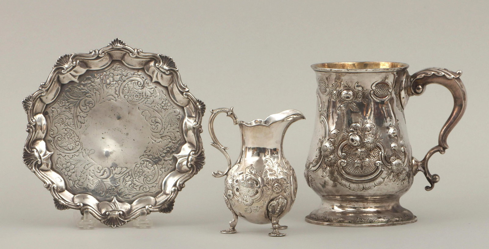 18th and 19th century English sterling silver: Group of (3) 18th and 19th century English sterling silver, London, with floral and scroll designs, to include: George III repousse tankard, Thomas Pratt & Arthur Humphries, London, 1782, with leaf-to