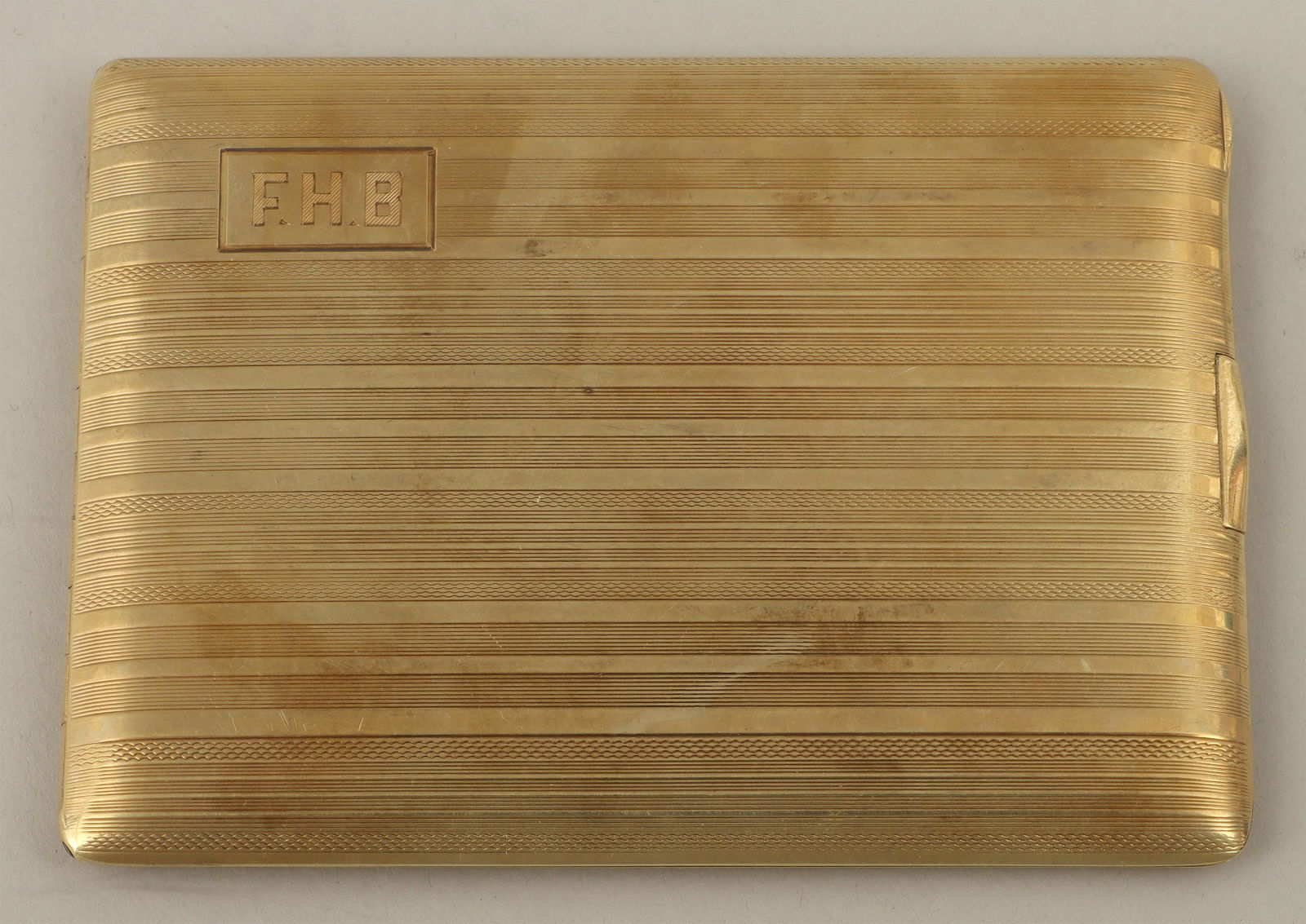 14k gold cigarette case: 14k gold cigarette case, Schanfein & Tamis, New York, NY, early 20th century, with engine-turned bands, monogrammed, inside inscribed ''F. Huntington Babcock Oyster Bay N.Y.'', marked and numbered on