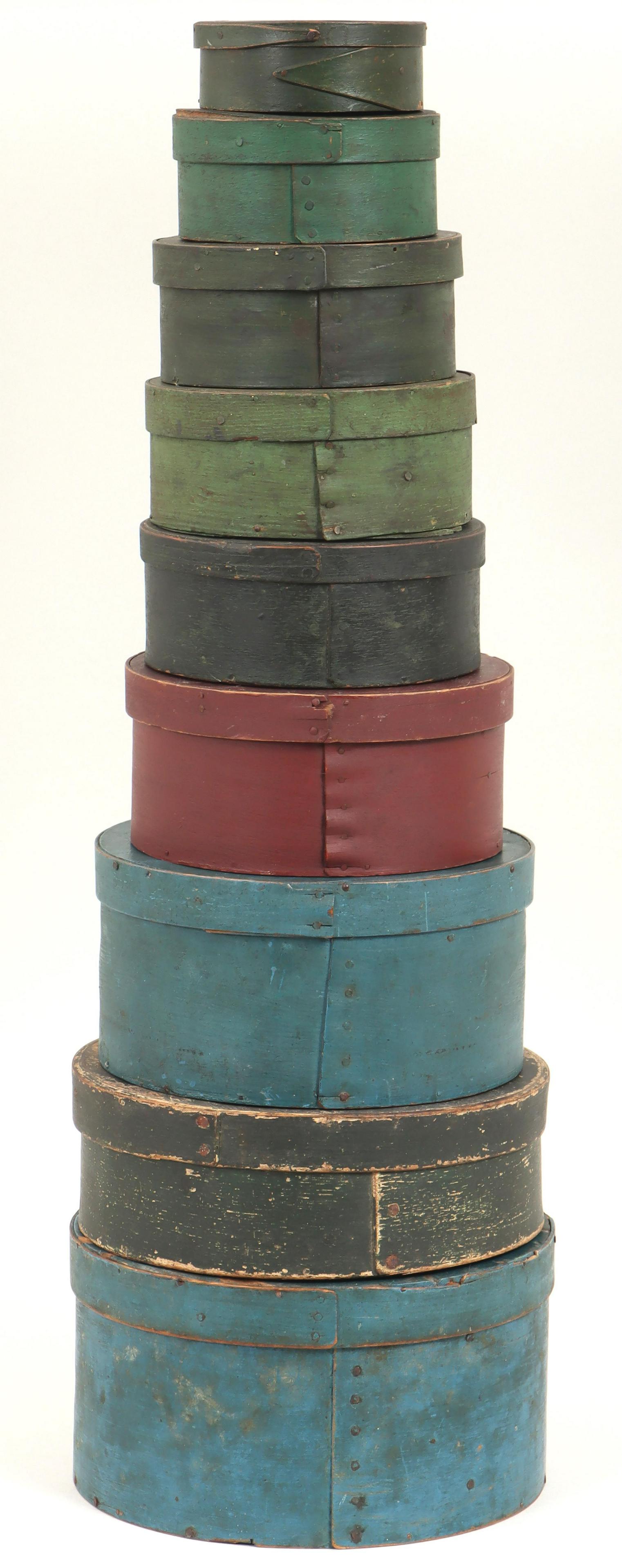 Group of (9) painted round pantry boxes: Group of (9) painted round pantry boxes, to include: red box with straight seam and floral decoration, top stenciled ''Smyrna 100'' along with illegible phrase, (markings and decoration worn off); (5)