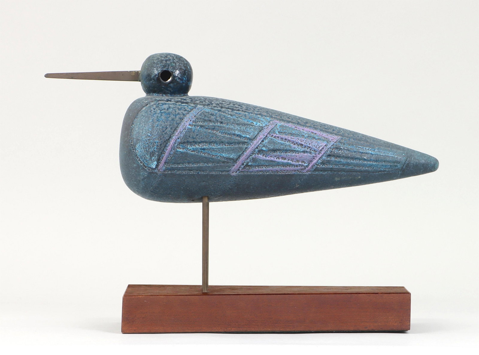 ALDO LONDI (Italian, 1911-2003): ALDO LONDI (Italian, 1911-2003), glazed ceramic bird with brass beak, mid-20th century, on stand, unsigned. Glaze gaps, crazing, beak reglued. 15-3/4''w, 4-1/2''d, 11-1/4''h (including stand).