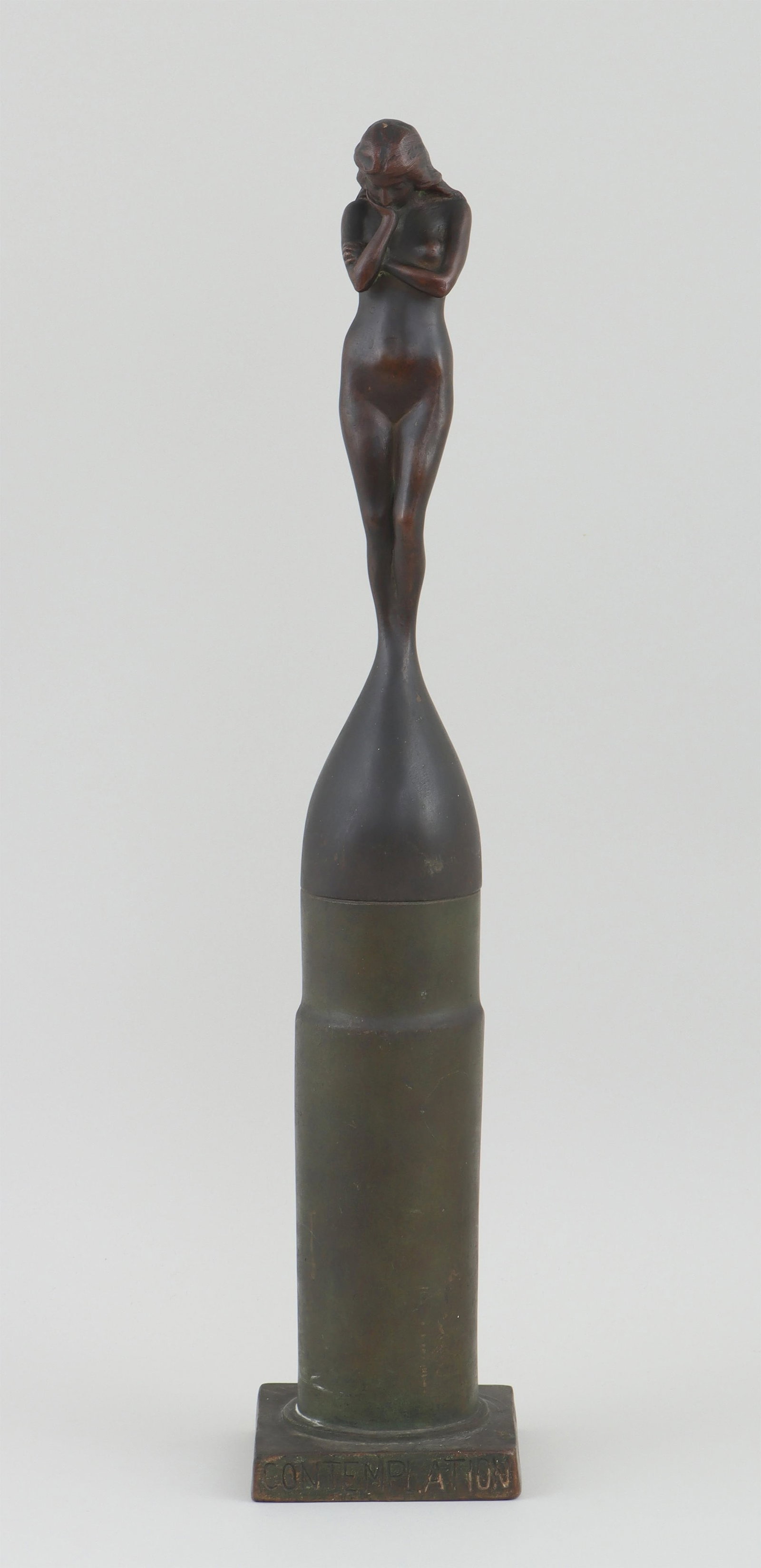 VINCENZO MISERENDINO (Italian, 1876-1943): VINCENZO MISERENDINO (Italian-American, 1876-1943), ''Contemplation'', 1917, WWI Trench art-style bronze with standing female nude atop a metal shell casing, signed ''M. Vincenzo'', dated and titled o