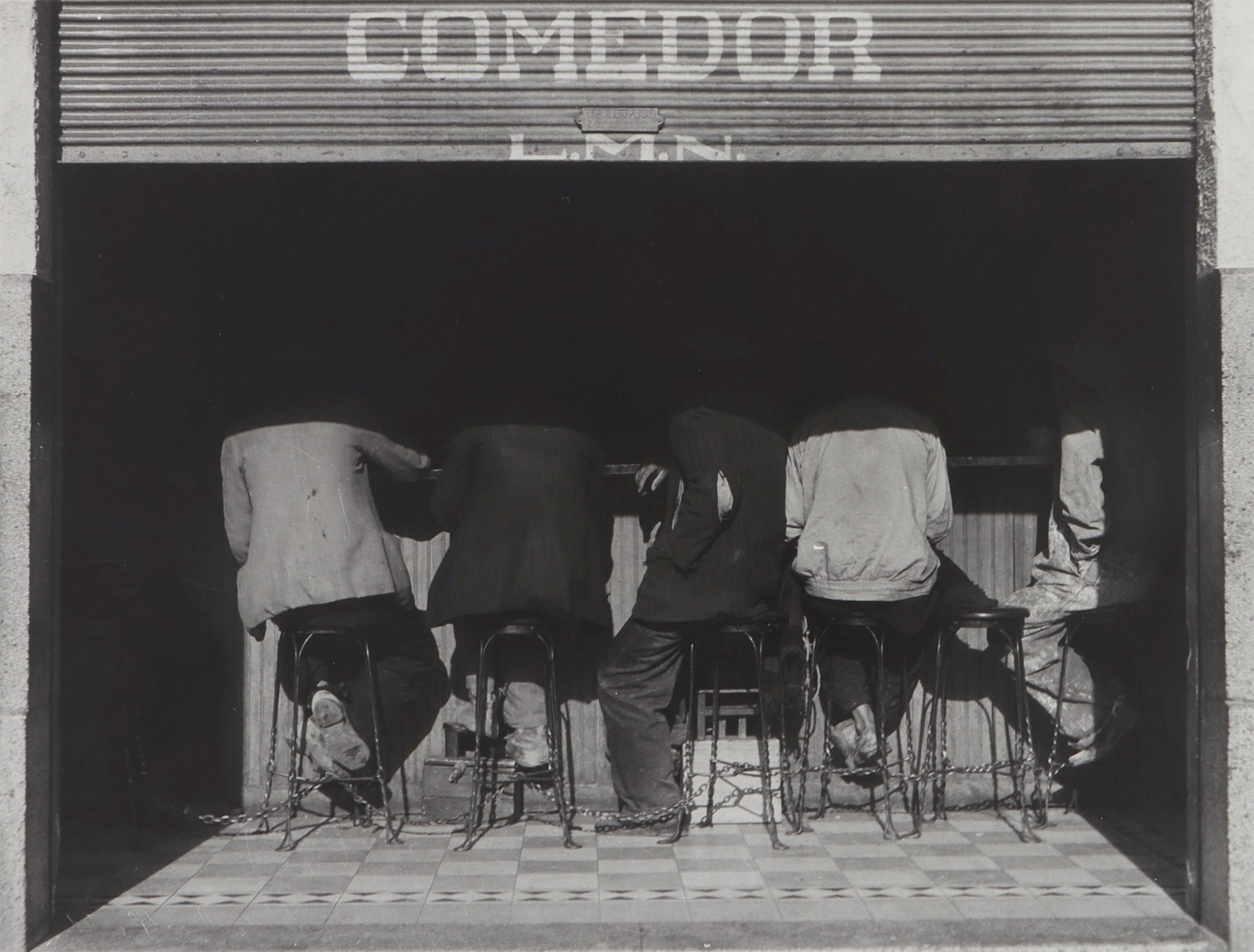 MANUEL ALVAREZ BRAVO (Mexican, 1902-2002): MANUEL ALVAREZ BRAVO (Mexican, 1902-2002), ''Los Agachados'', 1934, printed later, gelatin silver print, pencil signed on verso along with ''Mexico'' inscription. Corner mounted, matted, and framed un