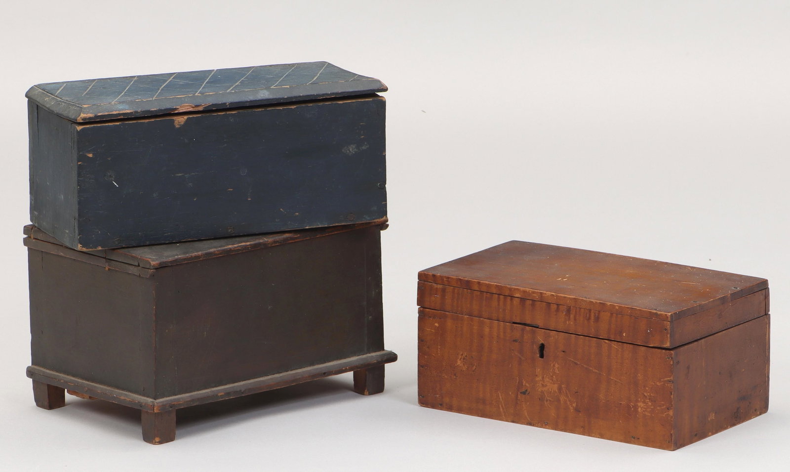 Group of (3) American country painted wood boxes: Group of (3) American country painted wood boxes with hinged lids, to include: blue-painted miniature blanket chest, (lacking half of bottom); yellow-painted box; and blue-painted box having hinged li